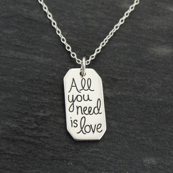 “All You Need Is Love” Necklace – Sterling Silver Quote Charm on 16" Chain