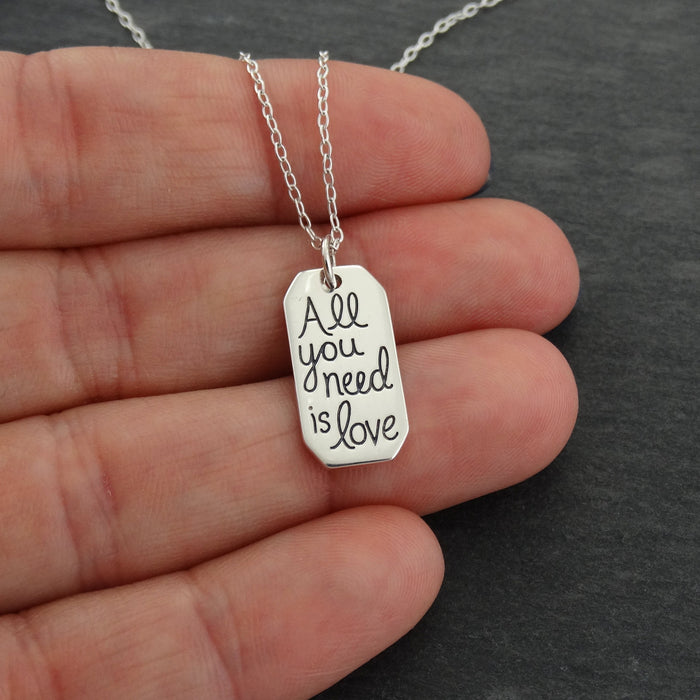 “All You Need Is Love” Necklace – Sterling Silver Quote Charm on 16" Chain