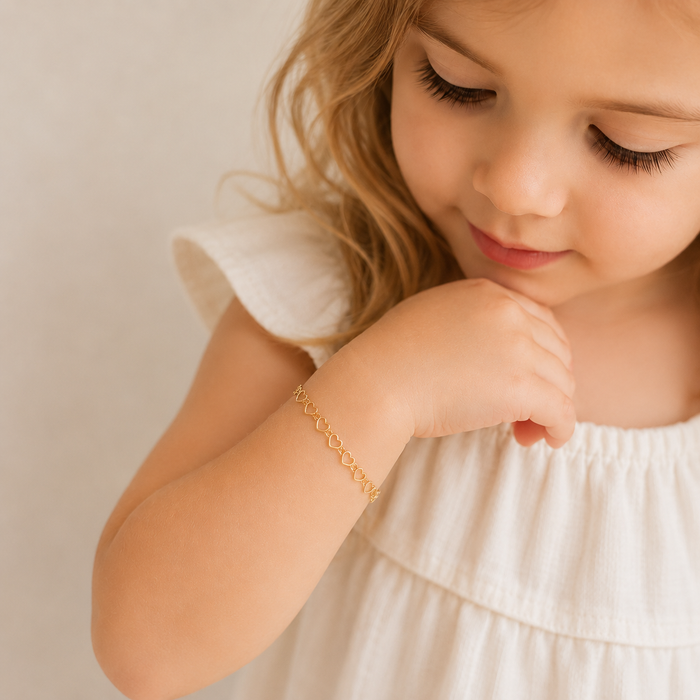heart chain bracelet on toddler model