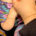 close up of mommy and me heart bracelets