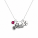 Necklace with motorcycle charm, red gemstone, and letter 'K' pendant on a white background