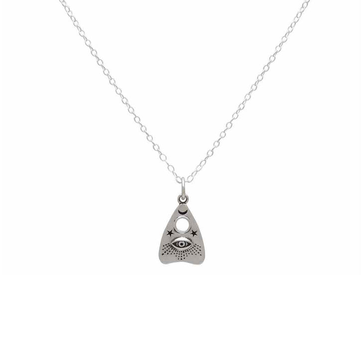 close up view of a ouija planchette sterling silver charm hanging from a delicate silver chain