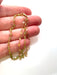 view of a hand holding a peridot handmade bracelet to showcase size