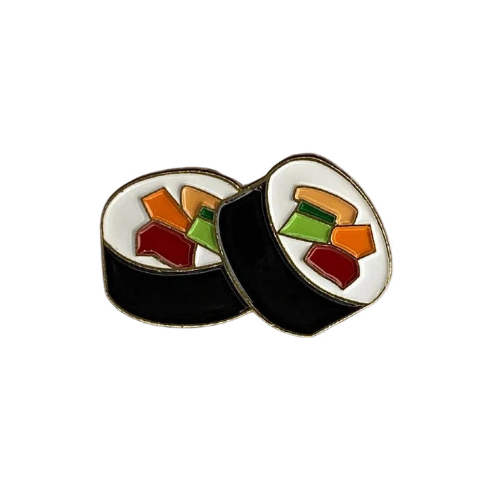 Two sushi roll pins with colorful toppings on a white background