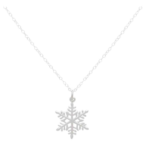 a close up view of a sterling silver snowflake charm on a silver chain on a solid white background