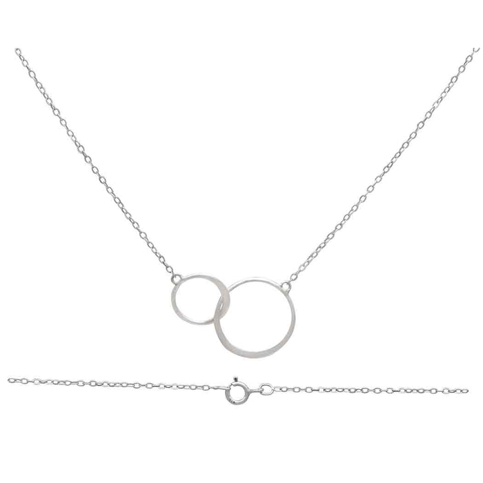  delicate sterling silver necklace featuring two interlocking circles of different sizes, symbolizing connection and unity. The necklace is displayed against a white background, showing both the pendant and the fine chain with a spring-ring clasp.